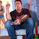 A GTA V promotional image depicting Jimmy De Santa flipping his sister, Tracey, off.